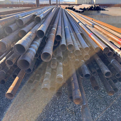 Stack of metal pipes on a construction site