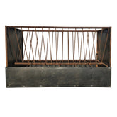 Rustic metal feeder with a dark finish on a white background