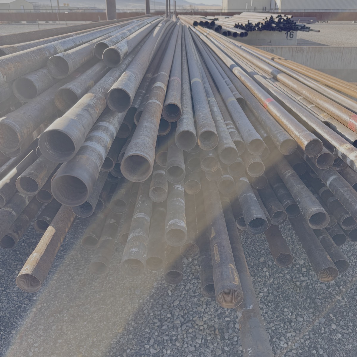 Stack of metal pipes on a construction site