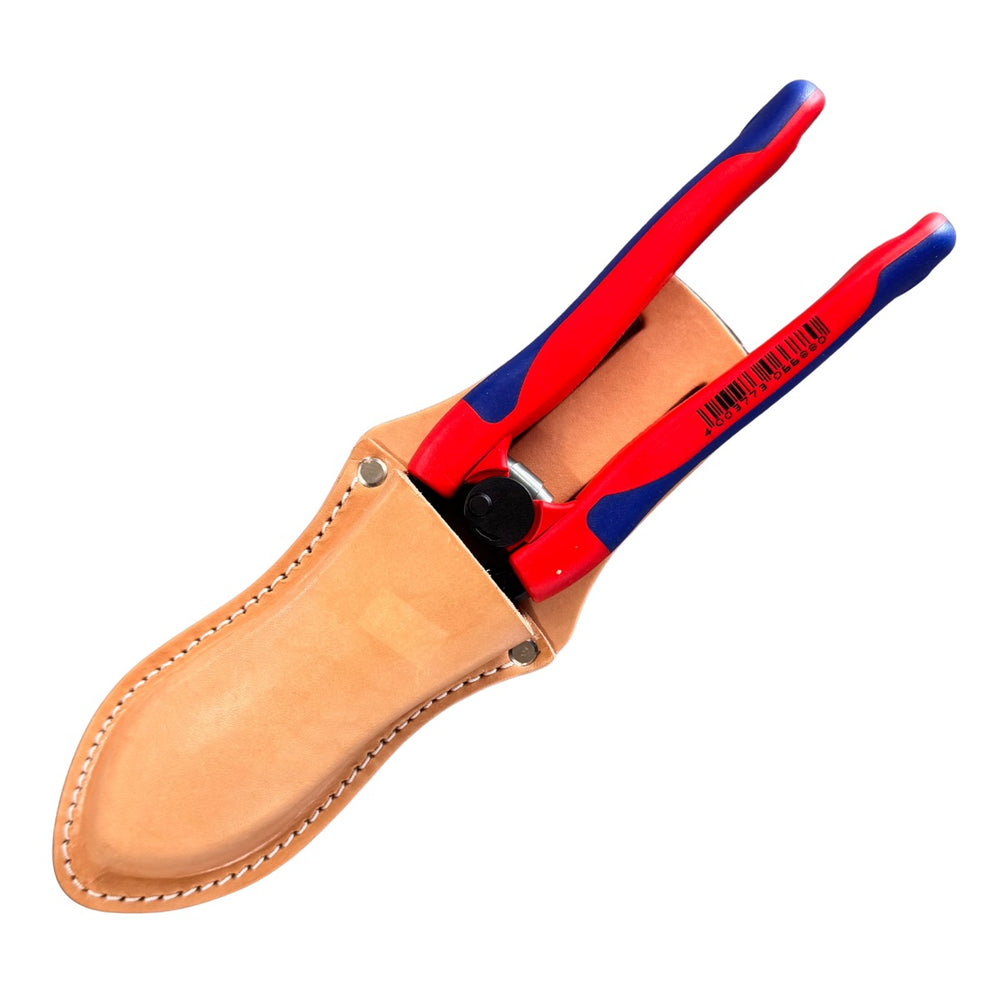 Red and blue pliers in a leather sheath on a white background